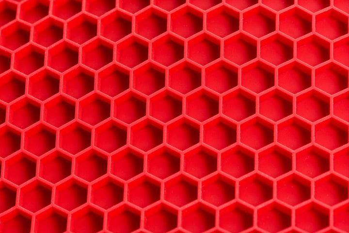 WOLL, Siliconen onderzetter met honingraatstructuur rond, D24cm, rood