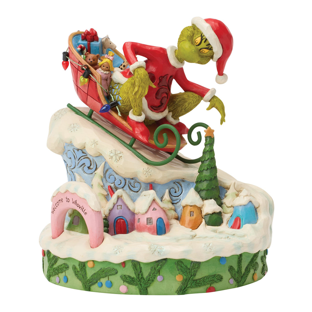 6018956 - The Grinch, on a small sled - 15cm, Jim Shore 2026