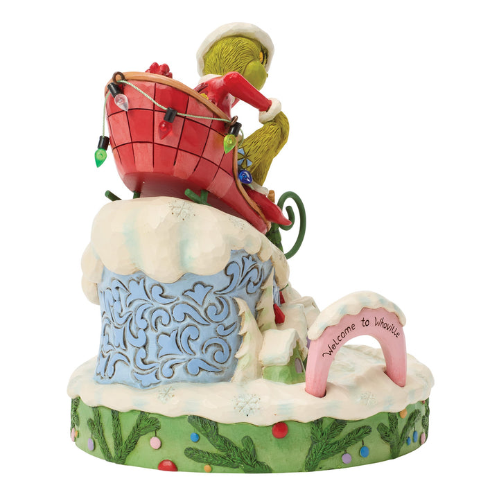 6018956 - The Grinch, on a small sled - 15cm, Jim Shore 2026