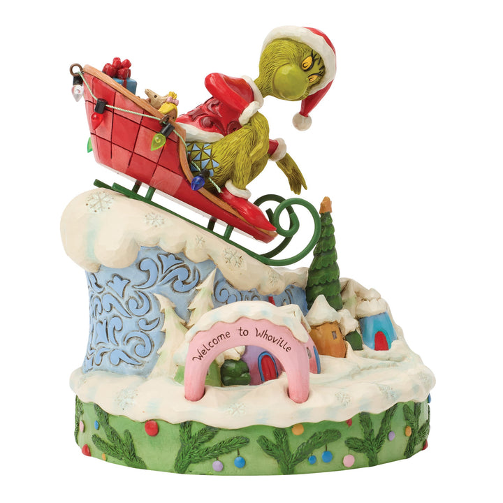 6018956 - The Grinch, on a small sled - 15cm, Jim Shore 2026