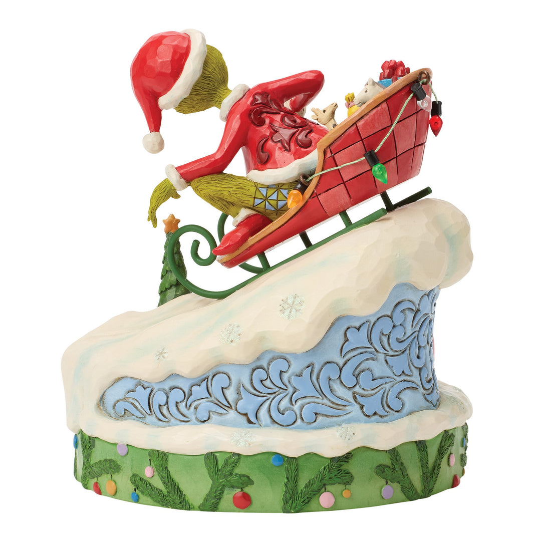 6018956 - The Grinch, on a small sled - 15cm, Jim Shore 2026