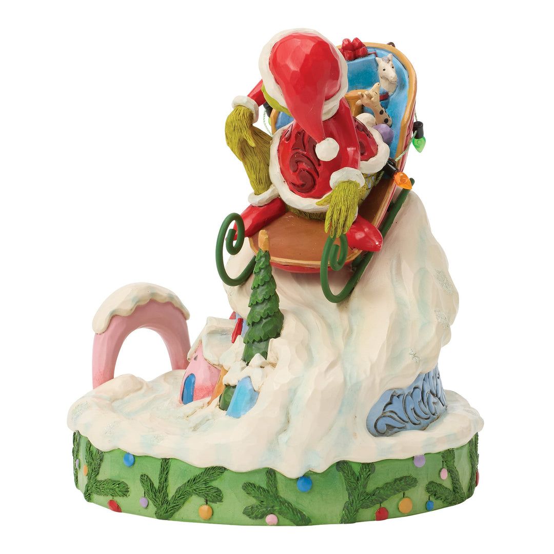 6018956 - The Grinch, on a small sled - 15cm, Jim Shore 2026
