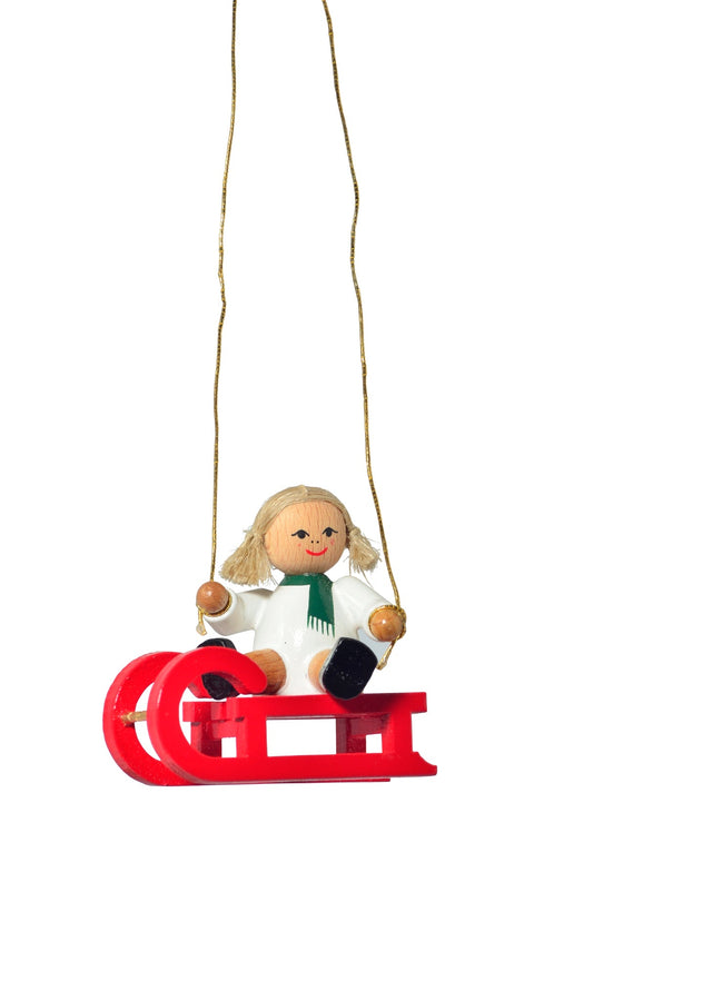 KWO - 81808 - KWO - Baumbehang Puppe auf Schlitten, Holzkunst, 5cm